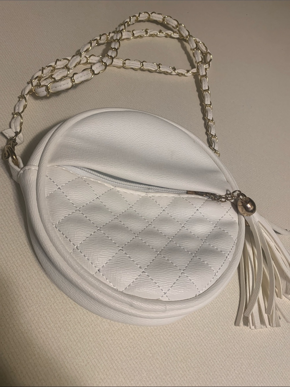 White Quilted Round Crossbody Bag with Gold Chain Strap